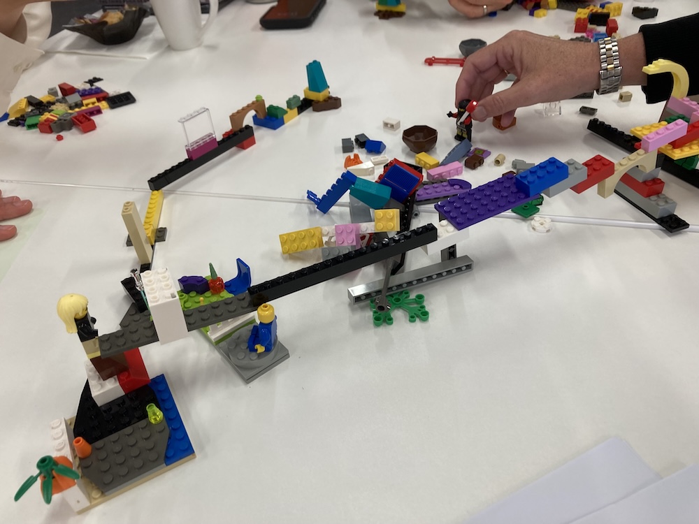 A LEGO® build involving bridges and building connections.