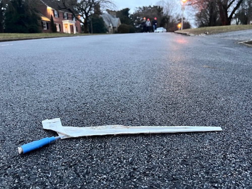 Medical implement discarded on road